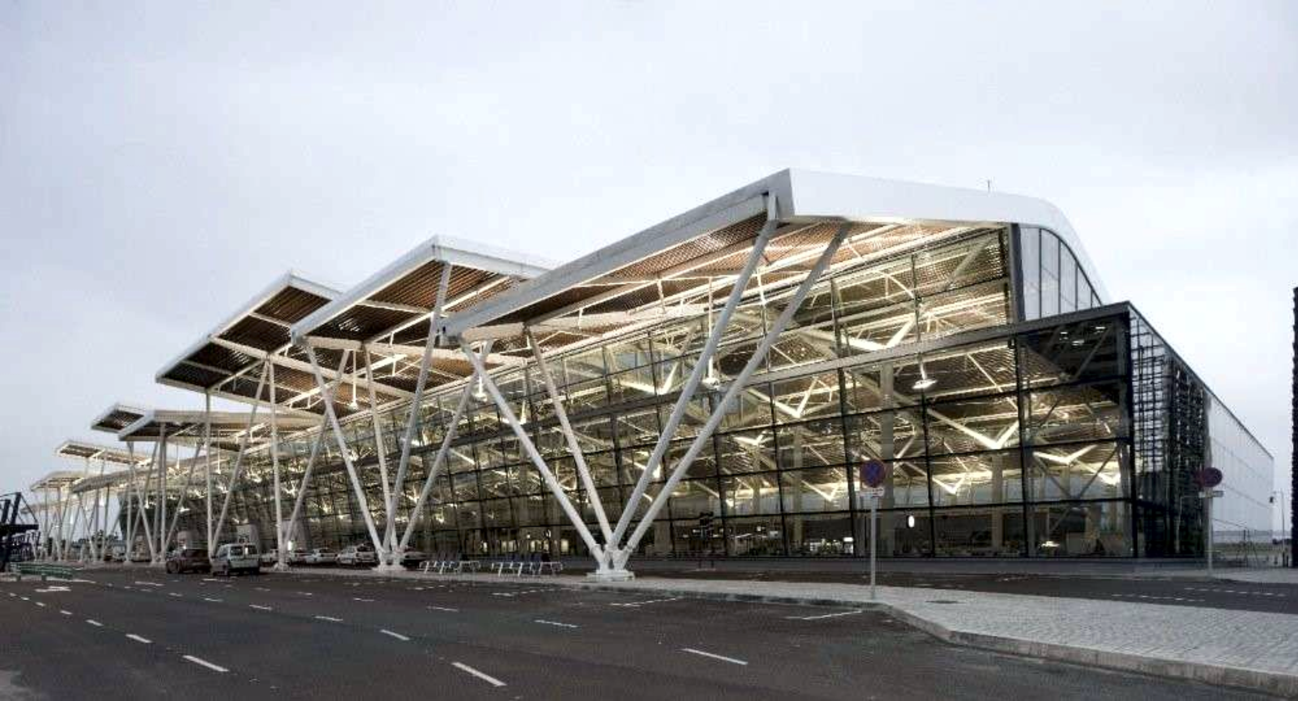 Modern airport terminal served by engineered airfield pavements